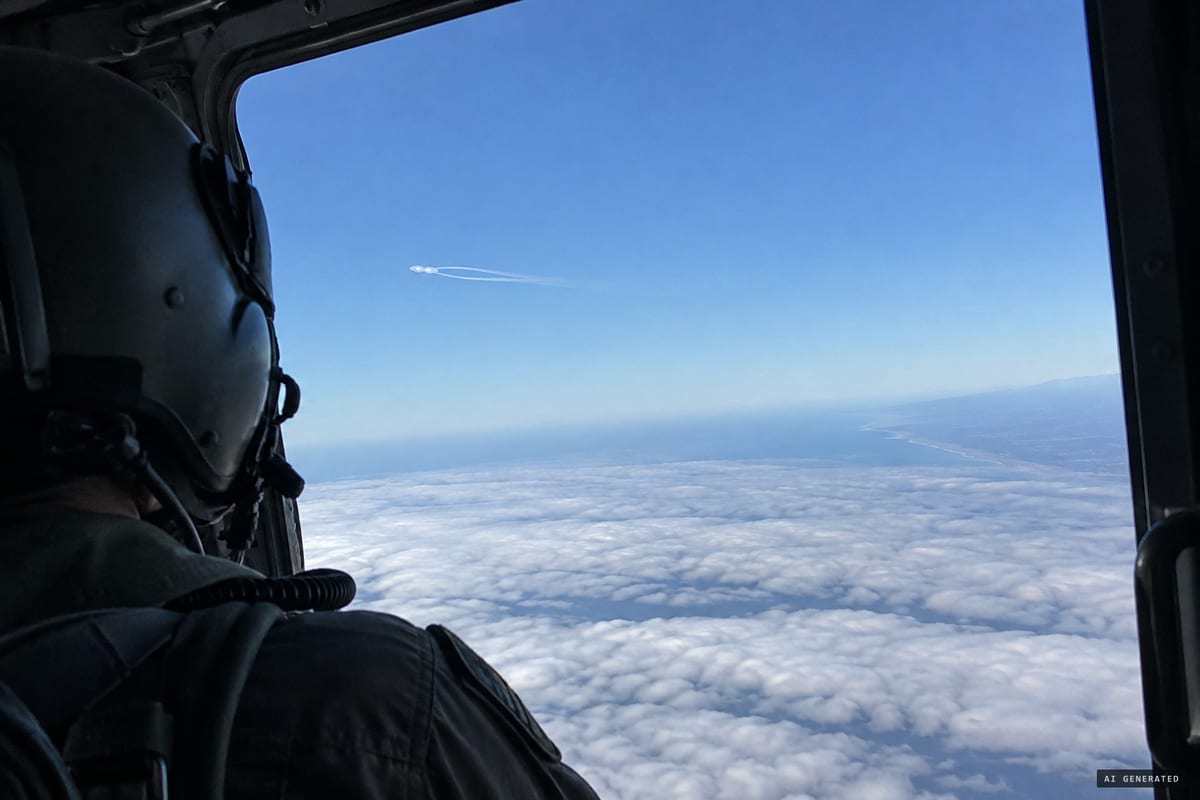 11 November 2014, off the coast of Valparaíso, Chile: a Navy helicopter crew films a flat, elongated object with two hot spots that kept pace with them and released a hot plume that merged into one wake.