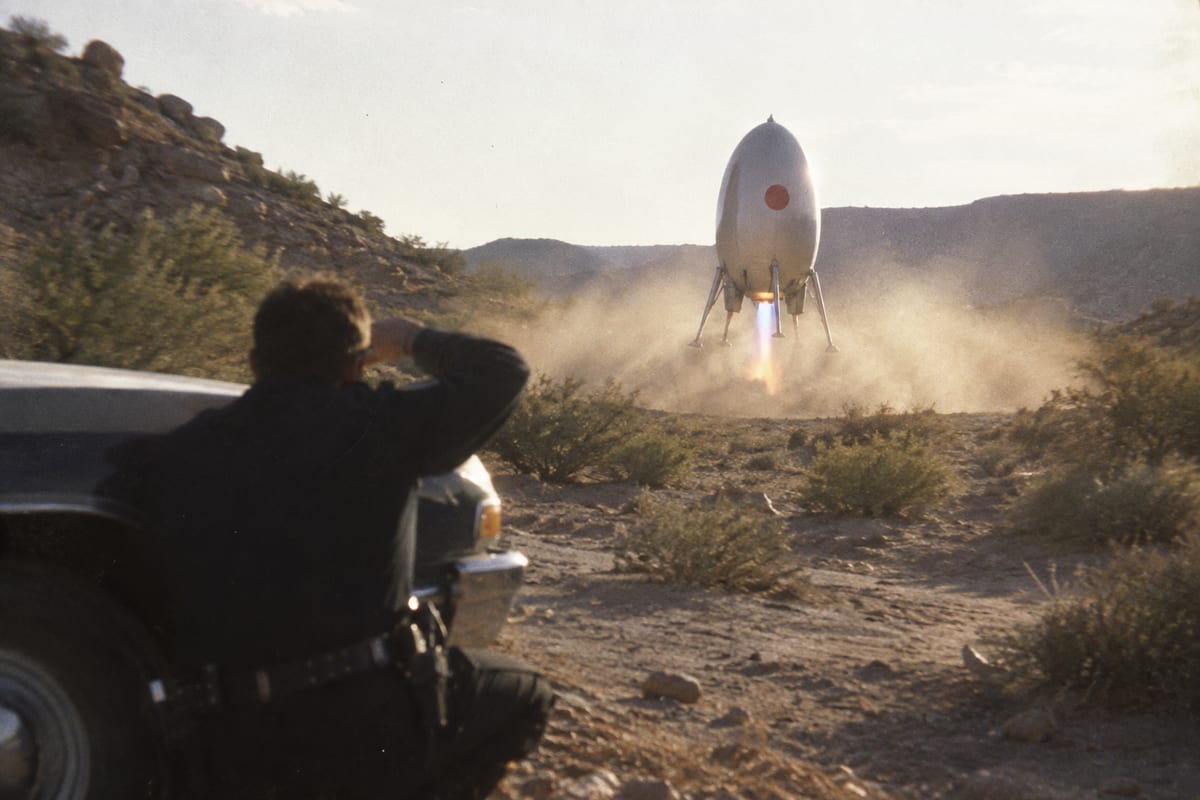 Socorro, New Mexico, 24 April 1964: a police officer watches an egg-shaped craft on four legs lift off on a blue-orange flame from a desert arroyo.