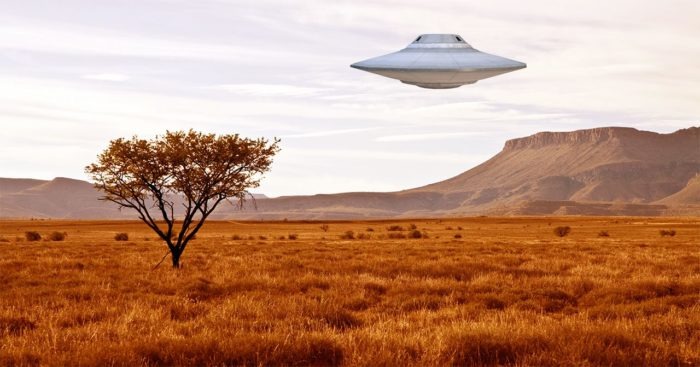 Artist's impression of a UFO over a South African landscape