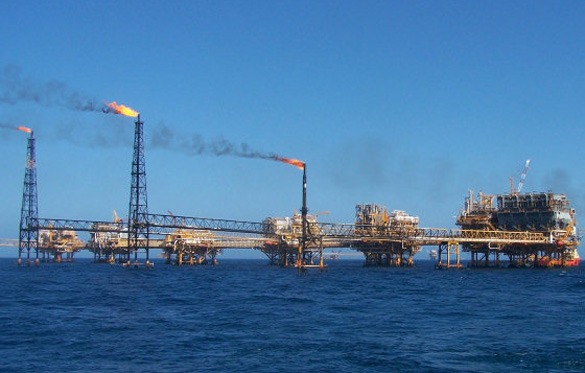 Gulf oil rigs in groups of three.